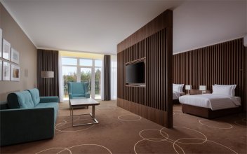 Premium Family Room with Double Bed, Single Bed and Sofa: Photo 2