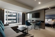Family Room with a double bed and a sofa, city view: Photo 10
