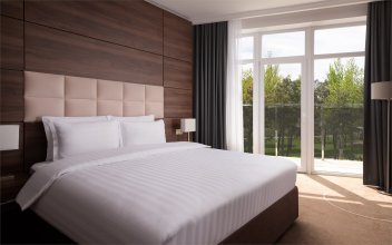 Junior Suite, Sea View - with a large double bed, armchair bed and sofa bed: Photo 1