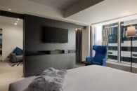 Family Room with a double bed and a sofa, city view: Photo 10