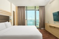 Suite Room with a Balcony and sea View - with a large double bed and sofa: Photo 6