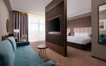 Premium Family Room with Double Bed, Single Bed and Sofa: Photo 1