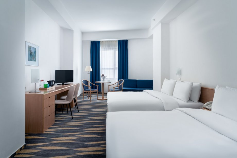 Superior room with 2 large beds and sofa