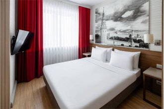 Апартаменты, одна спальня - с двуспальной кроватью: Фотография 1