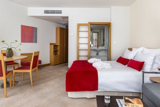 Family Room with a double bed and a sofa: Photo 2