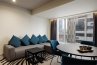 Family Room with a double bed and a sofa, city view: Photo 10