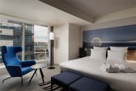 Family Room with a double bed and a sofa, city view: Photo 10